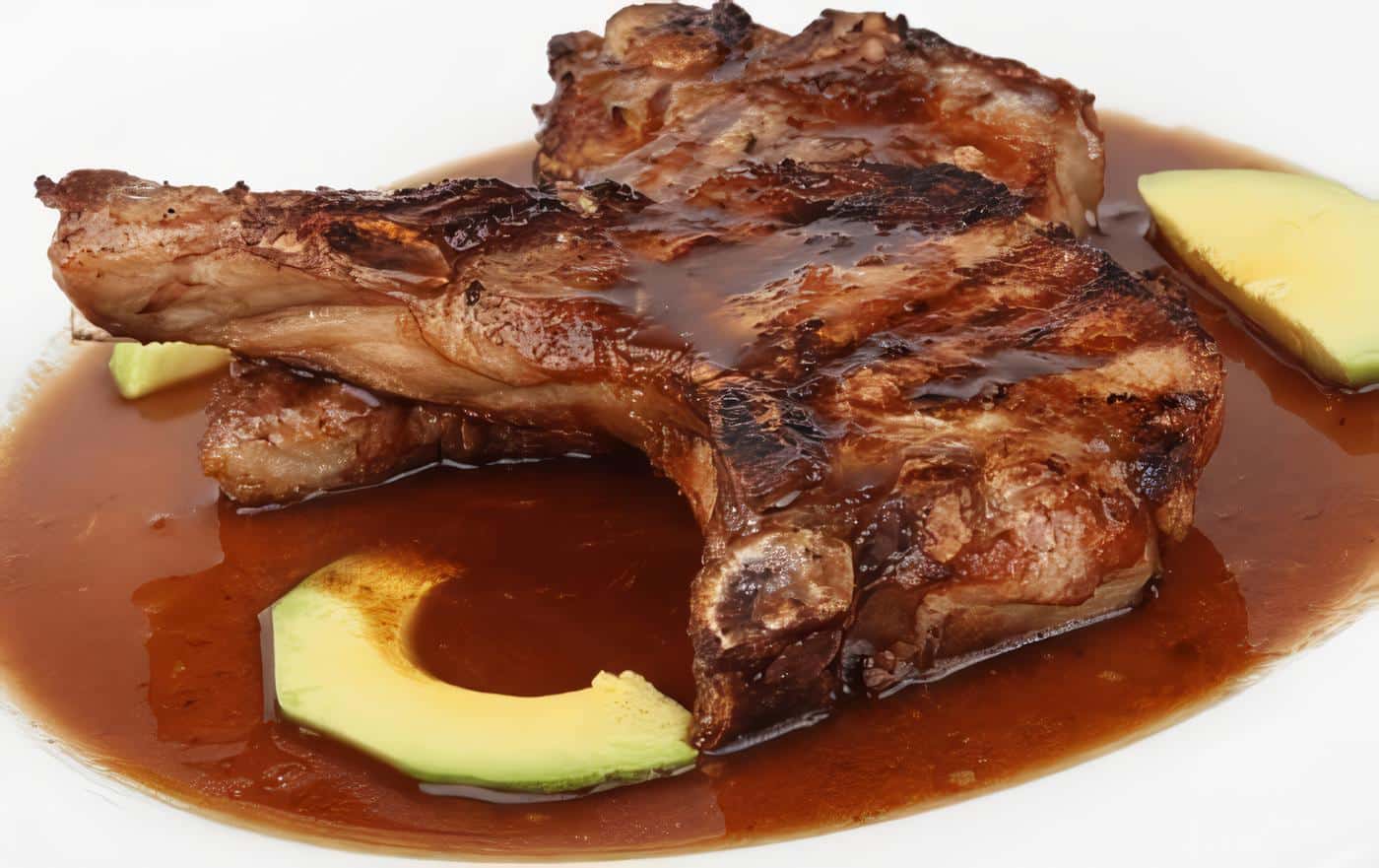 Chuletas de Cerdo Bañadas en Salsa de Coca Cola y Piña