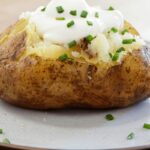 Papas con crema y trufa